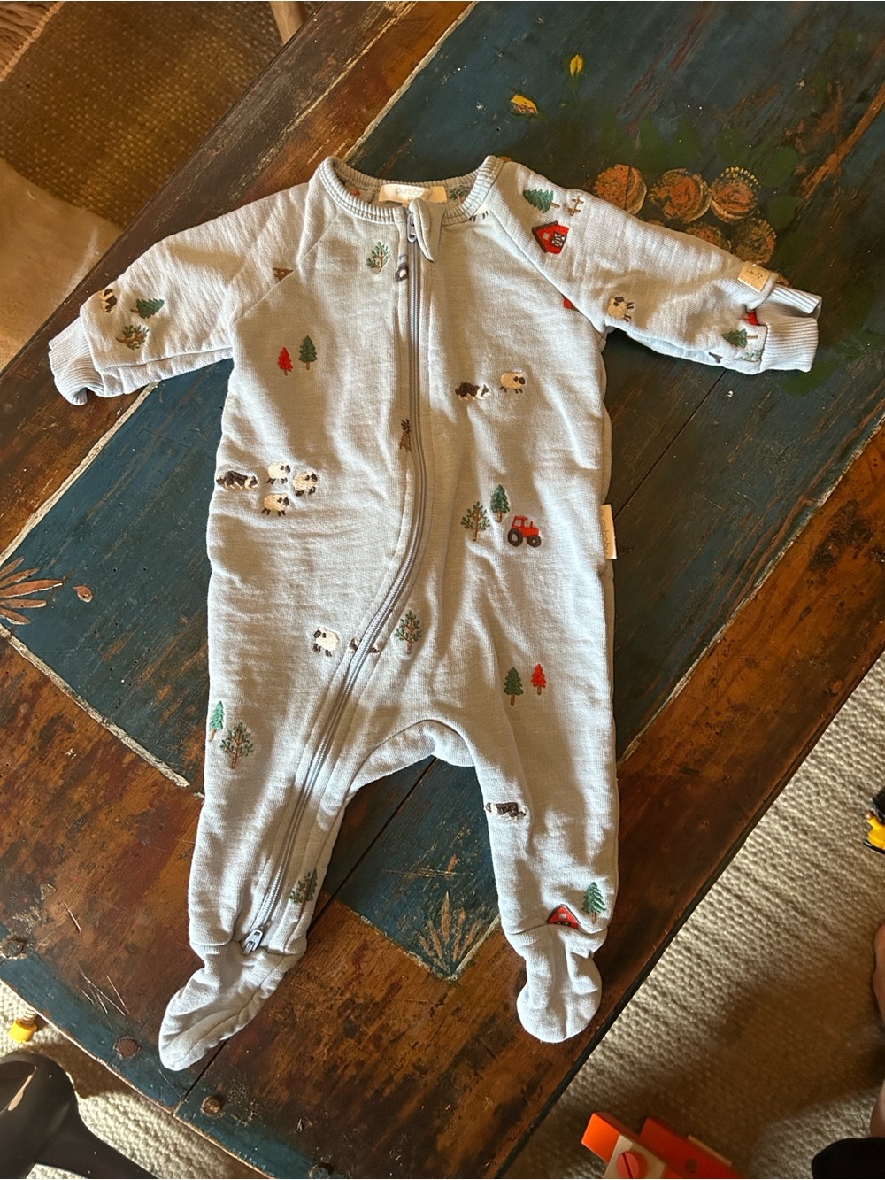Purebaby Light Blue Footed One-Piece with Forest & Tractor Motifs